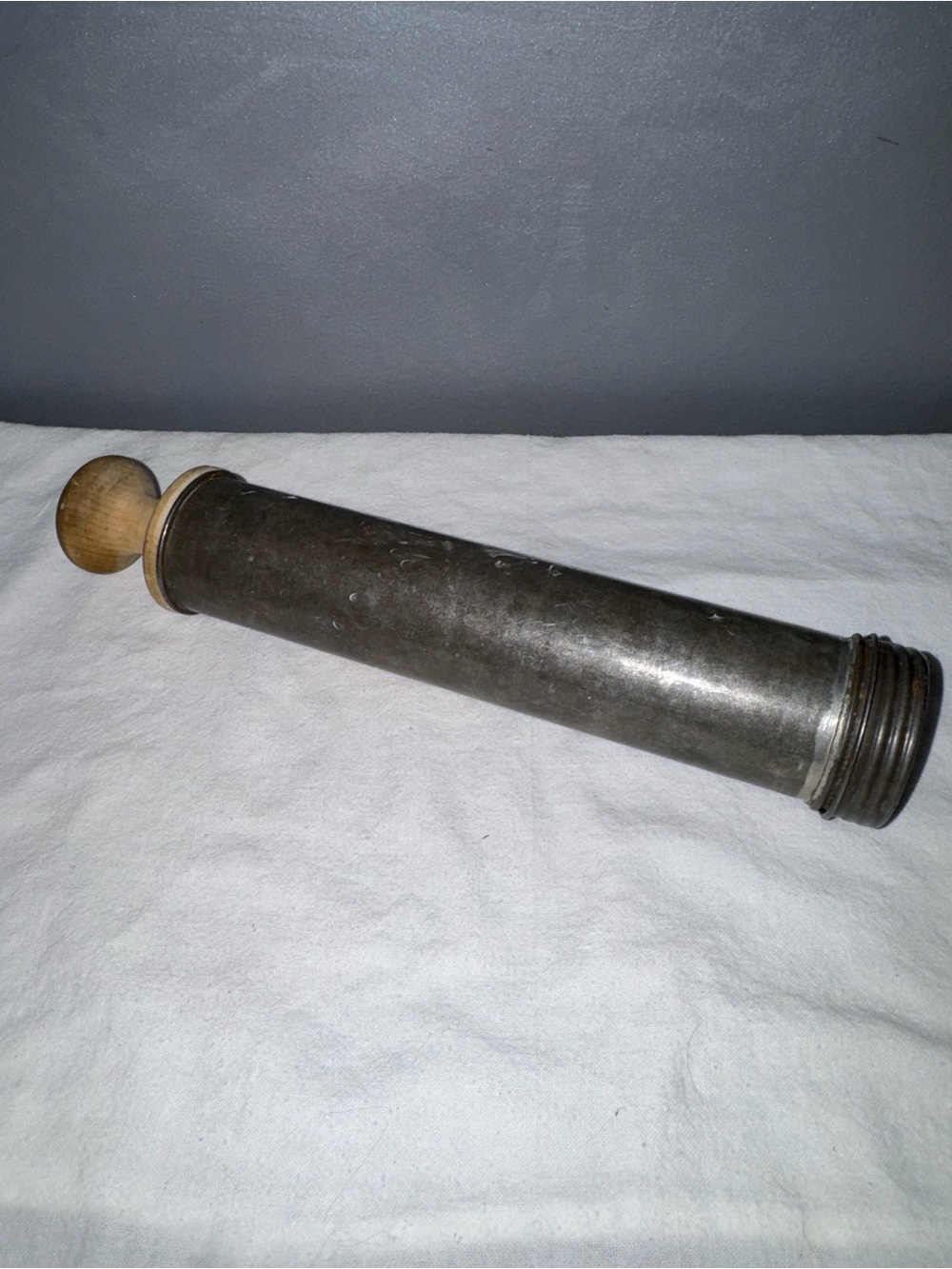 Antique metal star WWII cookie press with wooden plunger